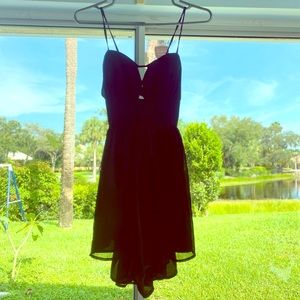 Black Romper by Brand Mustard Seed. Size Medium.
